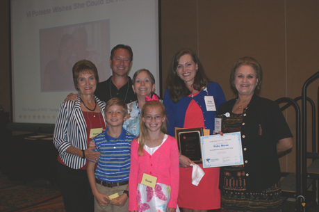 Vicki Bryan with her family after receiving the award